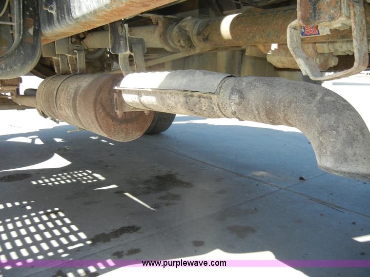 image for item D4117 1998 GMC C6500 flatbed truck