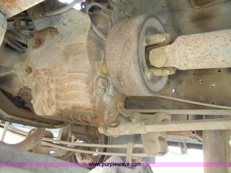 image for item D4117 1998 GMC C6500 flatbed truck