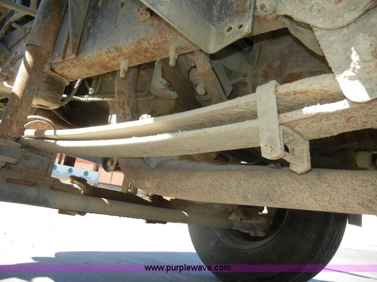 image for item D4117 1998 GMC C6500 flatbed truck