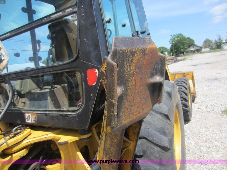image for item D5565 1998 John Deere 310SE backhoe