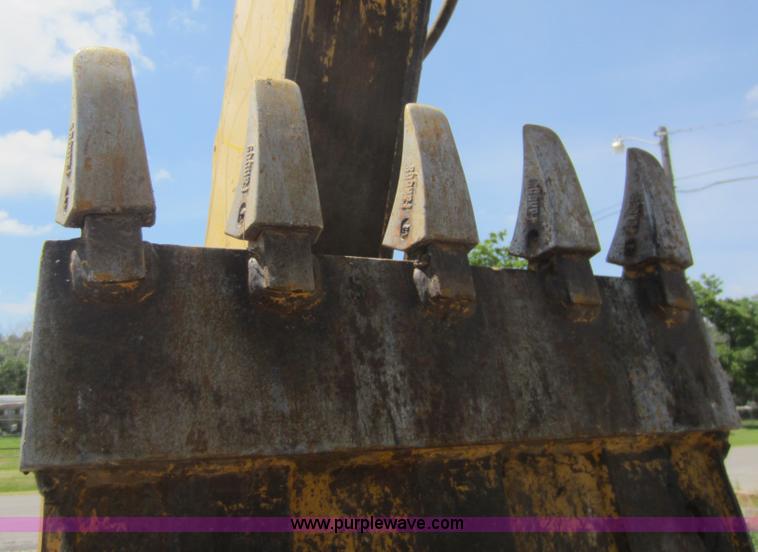 image for item D5565 1998 John Deere 310SE backhoe