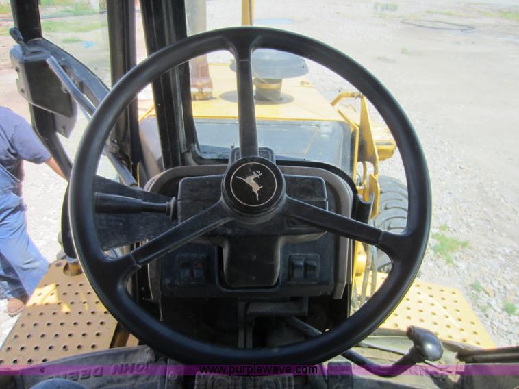 image for item D5565 1998 John Deere 310SE backhoe