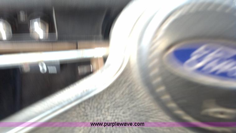 image for item D7933 1990 Ford F700 gin pole truck