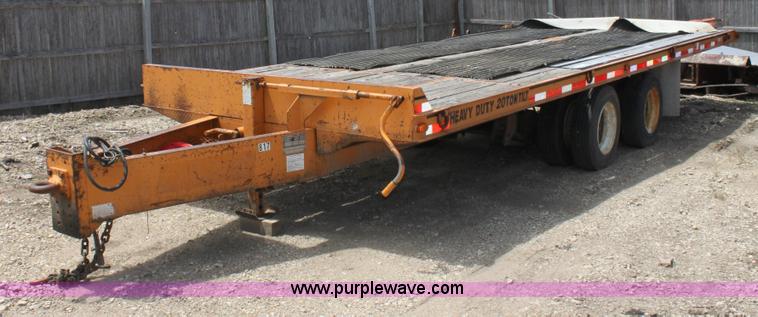 image for item D7995 2003 tandem axle tilt deck trailer