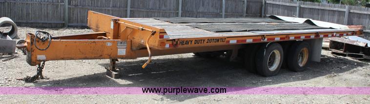 image for item D7995 2003 tandem axle tilt deck trailer