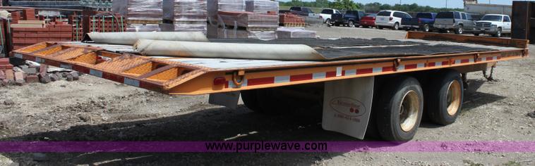 image for item D7995 2003 tandem axle tilt deck trailer