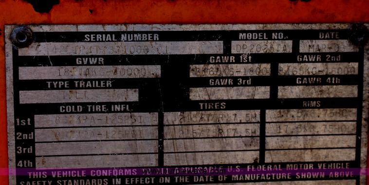 image for item D7995 2003 tandem axle tilt deck trailer