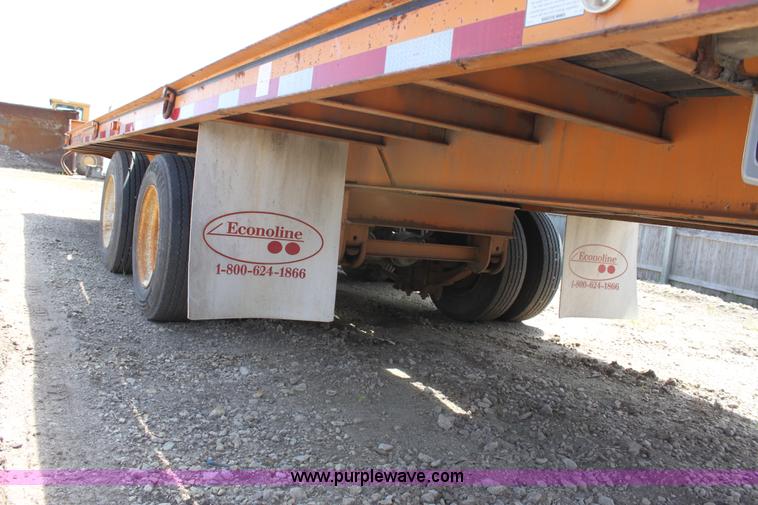 image for item D7995 2003 tandem axle tilt deck trailer