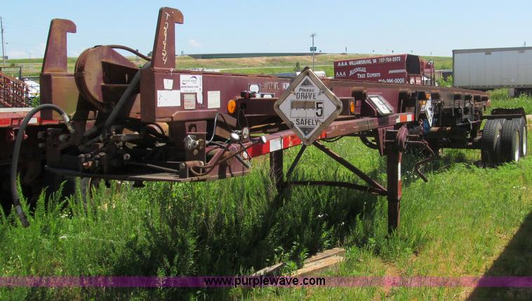 image for item B6368 1990 Clement 45' hydraulic roll off carrier