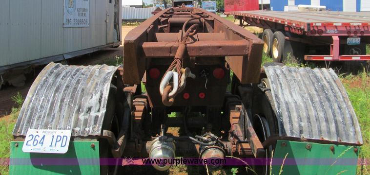 image for item B6368 1990 Clement 45' hydraulic roll off carrier
