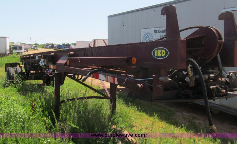 image for item B6368 1990 Clement 45' hydraulic roll off carrier