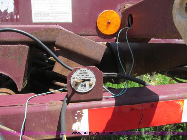 image for item B6368 1990 Clement 45' hydraulic roll off carrier