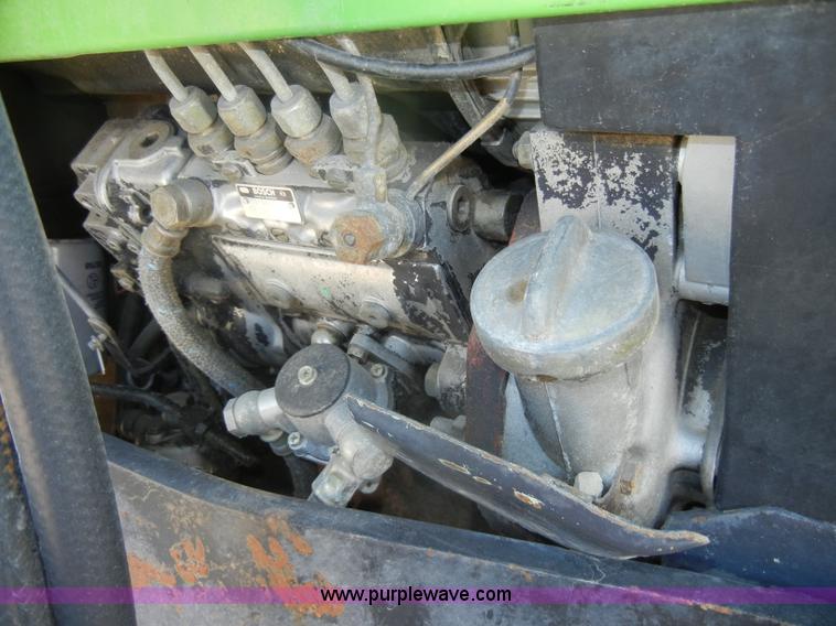 image for item D4126 1986 Deutz Allis 7085 MFWD tractor