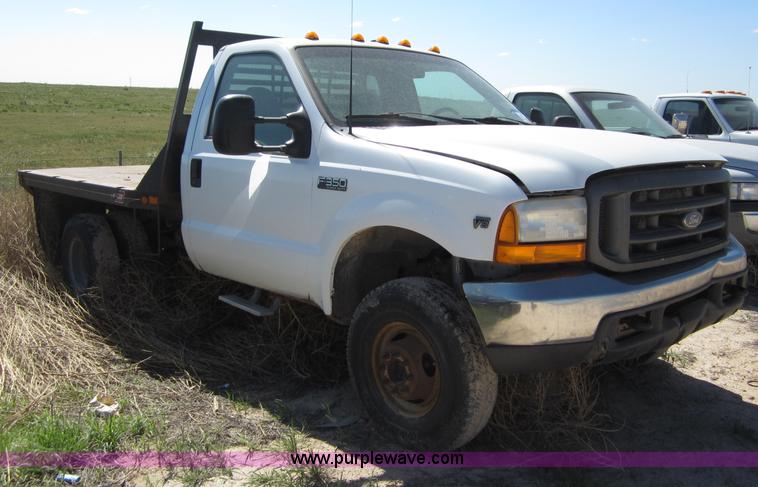 image for item B3270 1999 Ford F350 Super Duty flatbed pickup truck