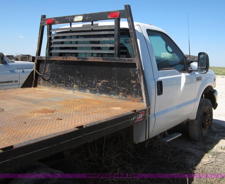 image for item B3270 1999 Ford F350 Super Duty flatbed pickup truck