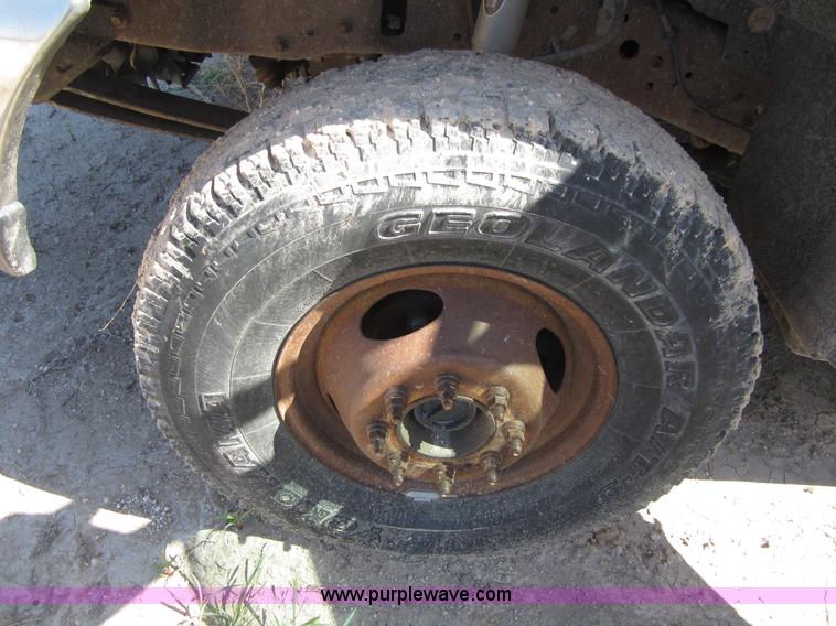 image for item B3270 1999 Ford F350 Super Duty flatbed pickup truck