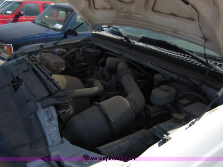 image for item B3270 1999 Ford F350 Super Duty flatbed pickup truck