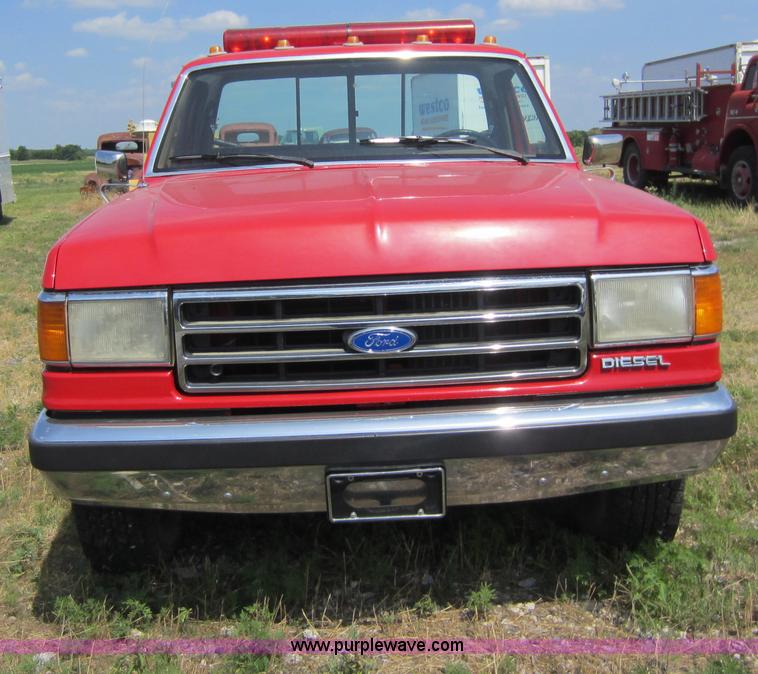 image for item D5578 1990 Ford F350 rollback wrecker truck