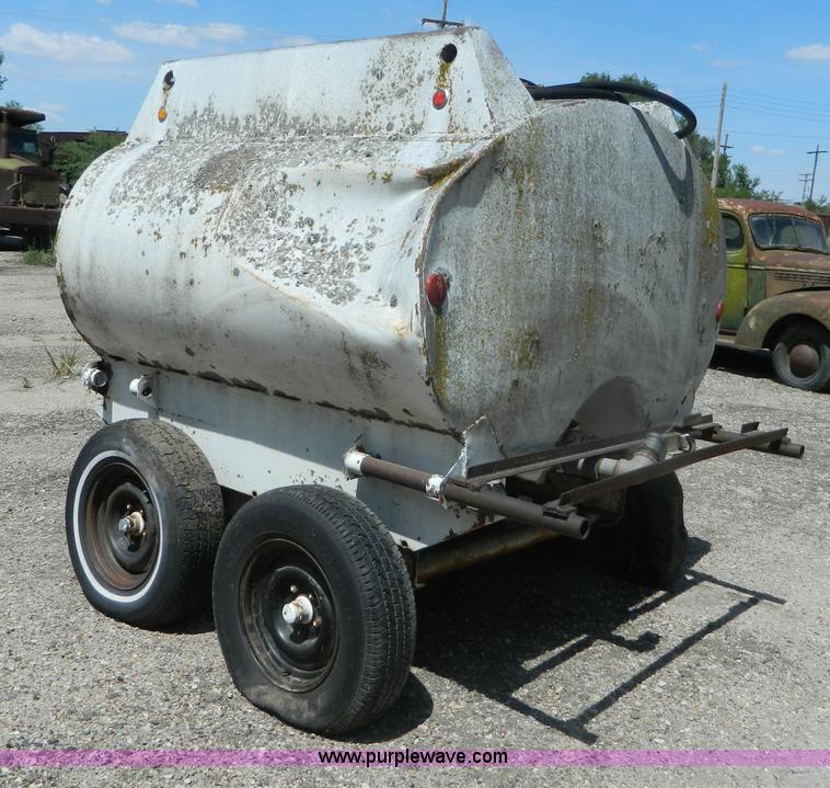 image for item M9780 Portable water tank on four wheel trailer