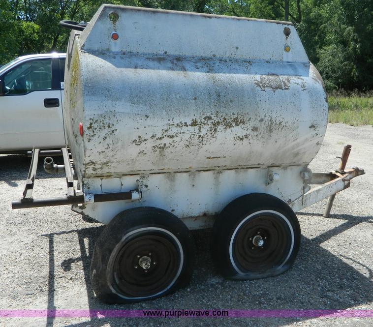 image for item M9780 Portable water tank on four wheel trailer