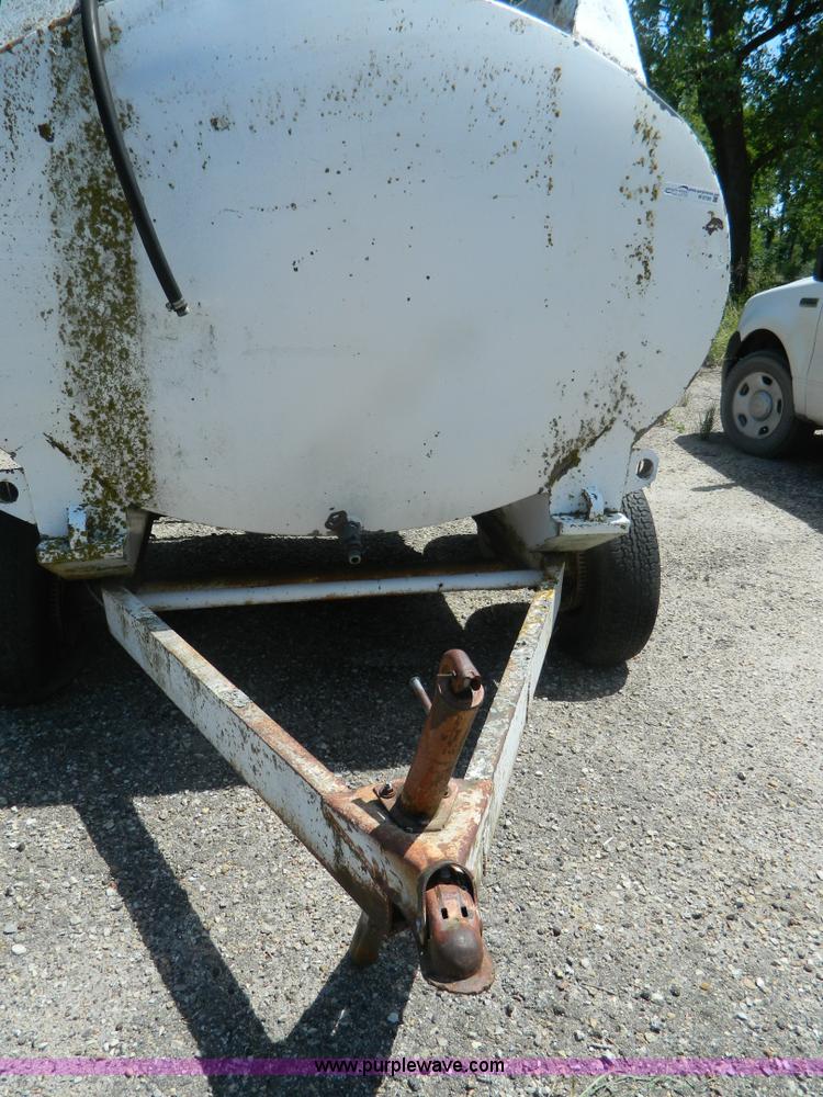 image for item M9780 Portable water tank on four wheel trailer