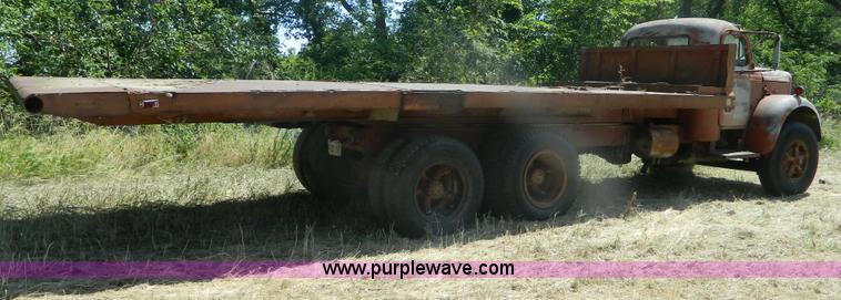 image for item M9804 1961 Gold Comet Reo flatbed truck
