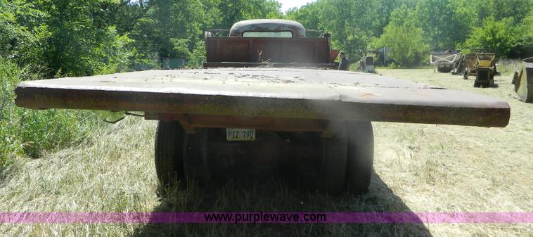 image for item M9804 1961 Gold Comet Reo flatbed truck