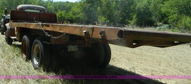 image for item M9804 1961 Gold Comet Reo flatbed truck