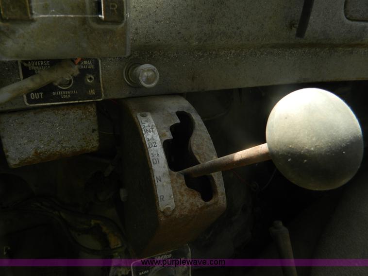 image for item M9804 1961 Gold Comet Reo flatbed truck