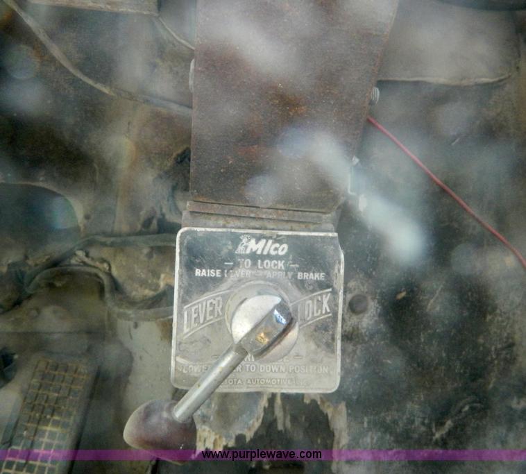 image for item M9804 1961 Gold Comet Reo flatbed truck