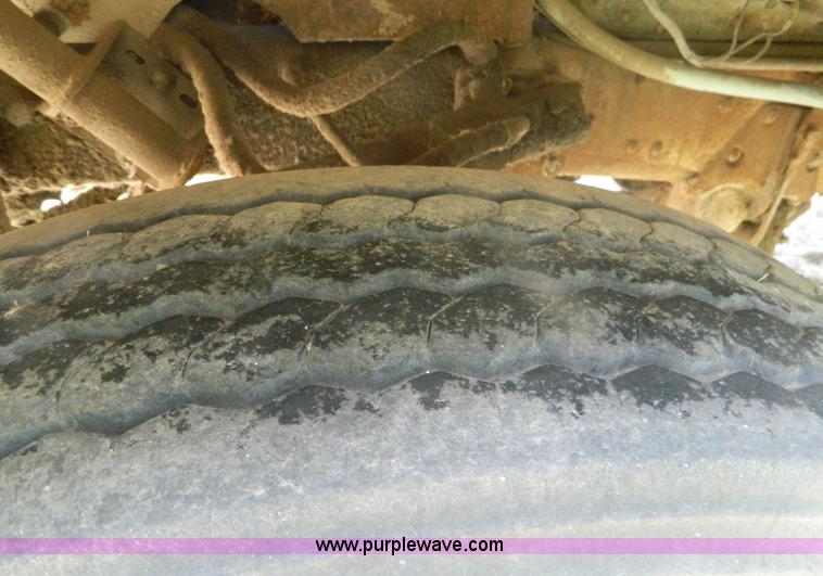 image for item M9804 1961 Gold Comet Reo flatbed truck