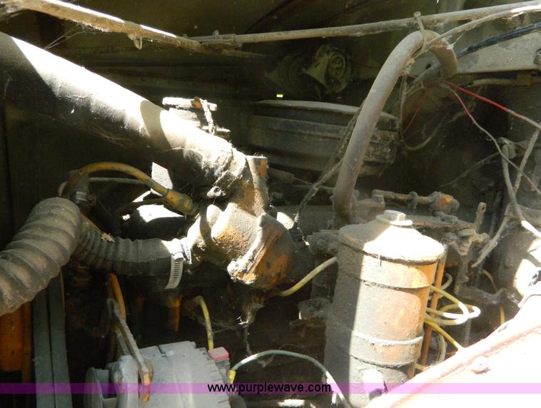 image for item M9804 1961 Gold Comet Reo flatbed truck