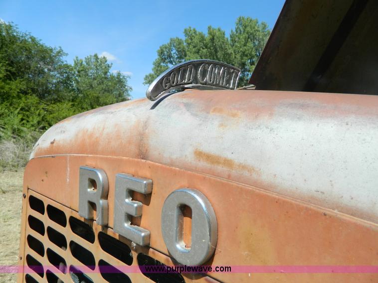 image for item M9804 1961 Gold Comet Reo flatbed truck