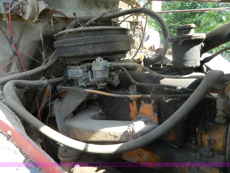 image for item M9804 1961 Gold Comet Reo flatbed truck