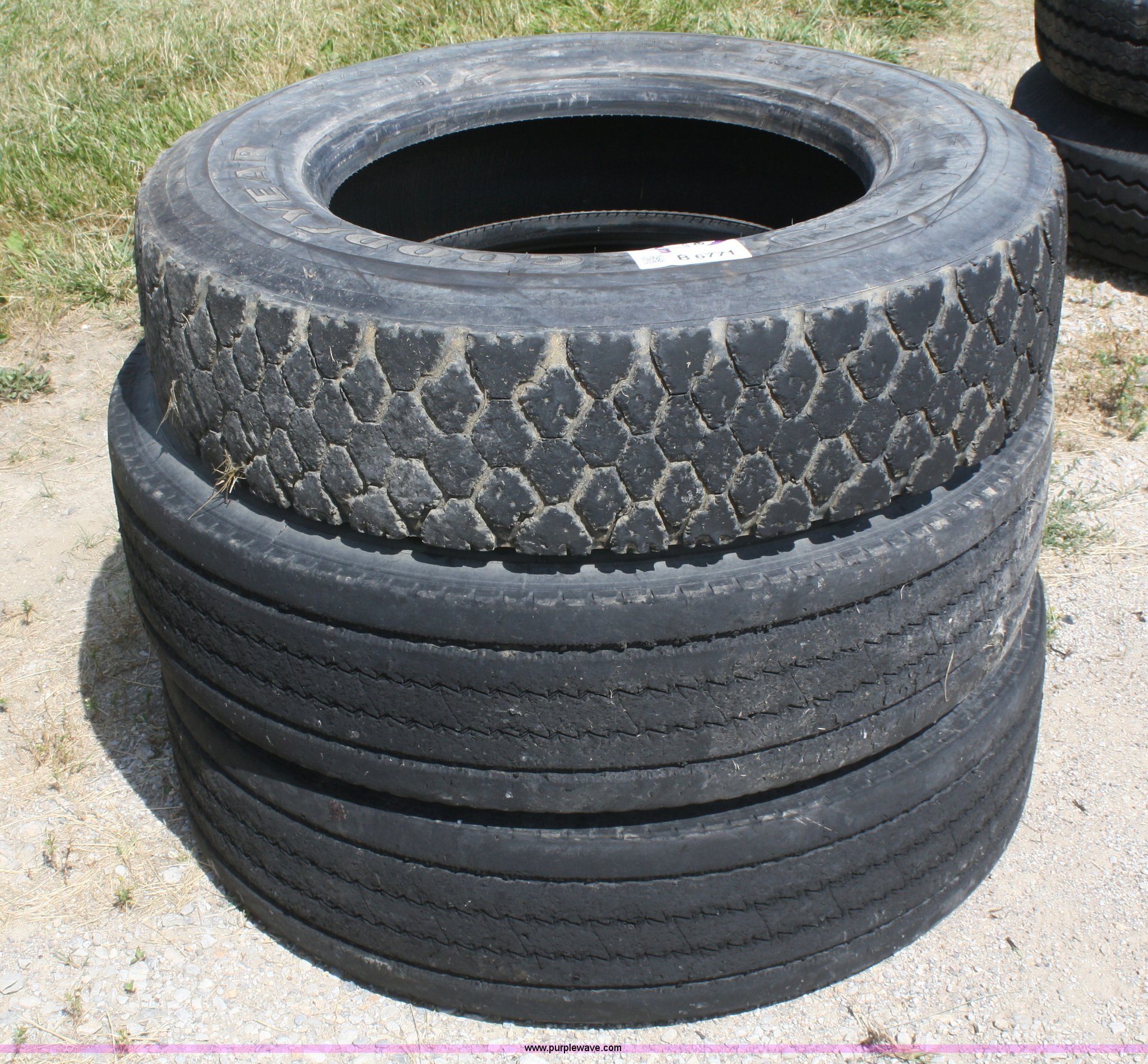 (3) used 265/75R22.5 tires in McLouth, KS Item B6771 sold Purple Wave
