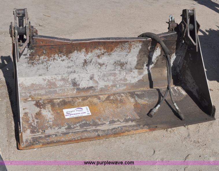 image for item A5932 4-in-1 skid steer bucket