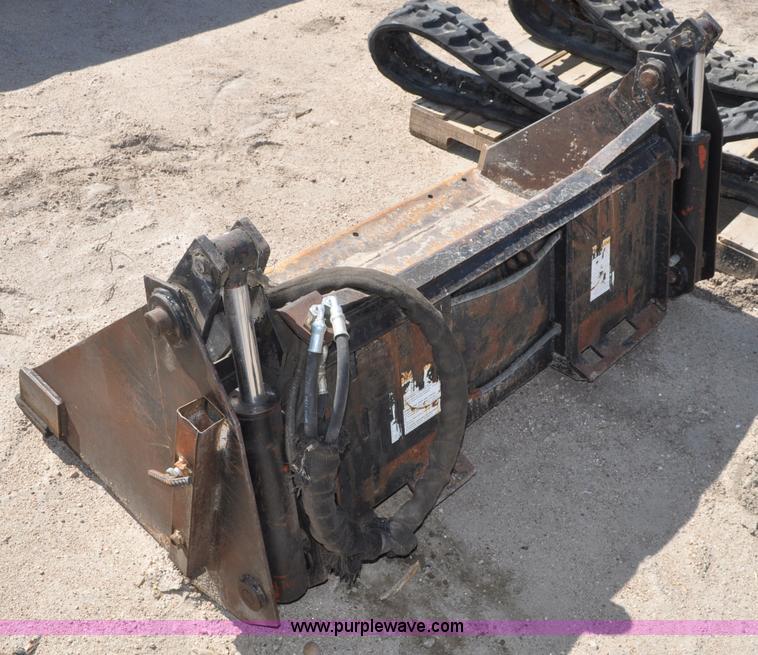 image for item A5932 4-in-1 skid steer bucket