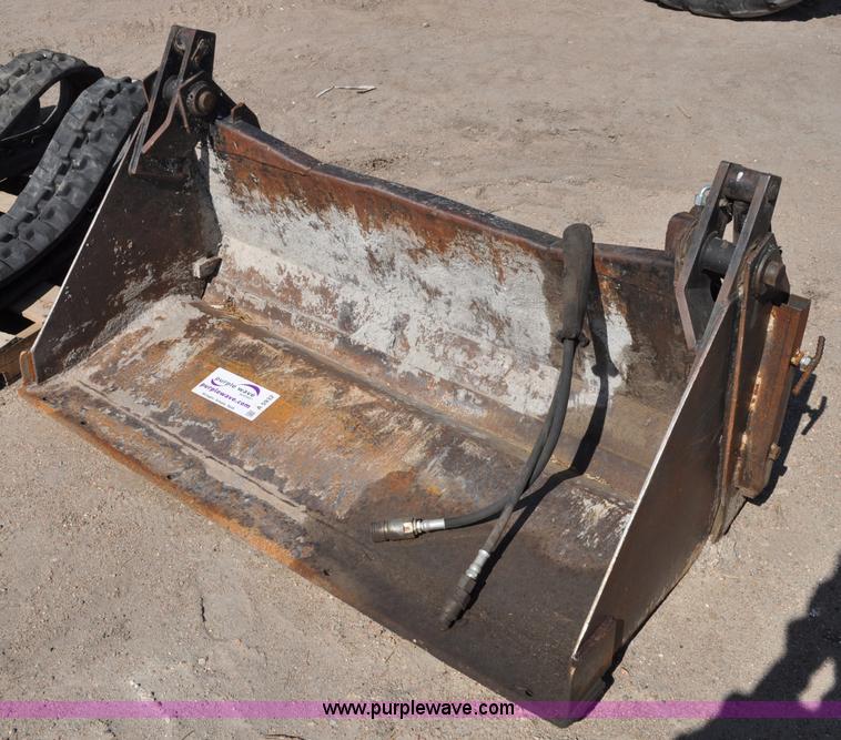 image for item A5932 4-in-1 skid steer bucket