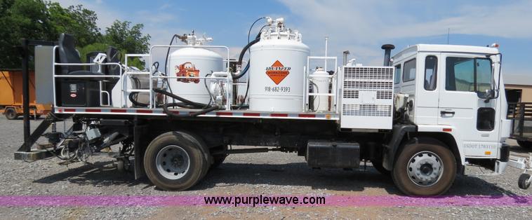 image for item B2369 1987 Volvo FE6 paint striper truck