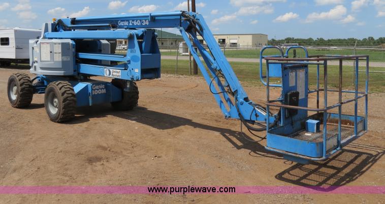 image for item B2387 1999 Genie Z-60/34 articulating boom lift