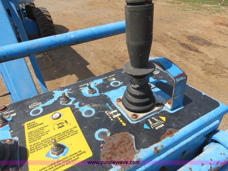image for item B2387 1999 Genie Z-60/34 articulating boom lift