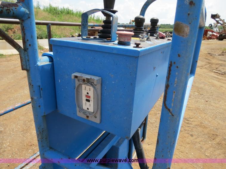 image for item B2387 1999 Genie Z-60/34 articulating boom lift