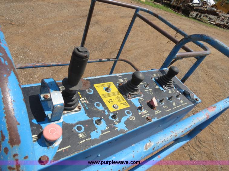 image for item B2387 1999 Genie Z-60/34 articulating boom lift