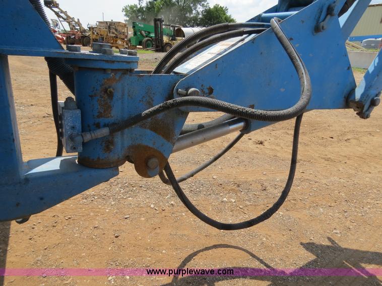 image for item B2387 1999 Genie Z-60/34 articulating boom lift