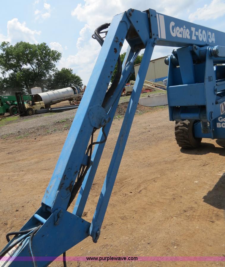 image for item B2387 1999 Genie Z-60/34 articulating boom lift