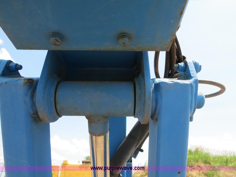 image for item B2387 1999 Genie Z-60/34 articulating boom lift