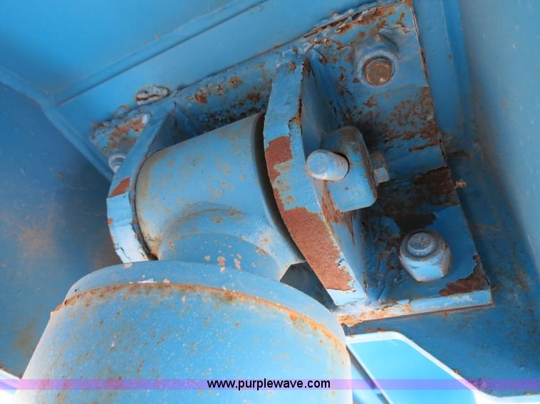 image for item B2387 1999 Genie Z-60/34 articulating boom lift