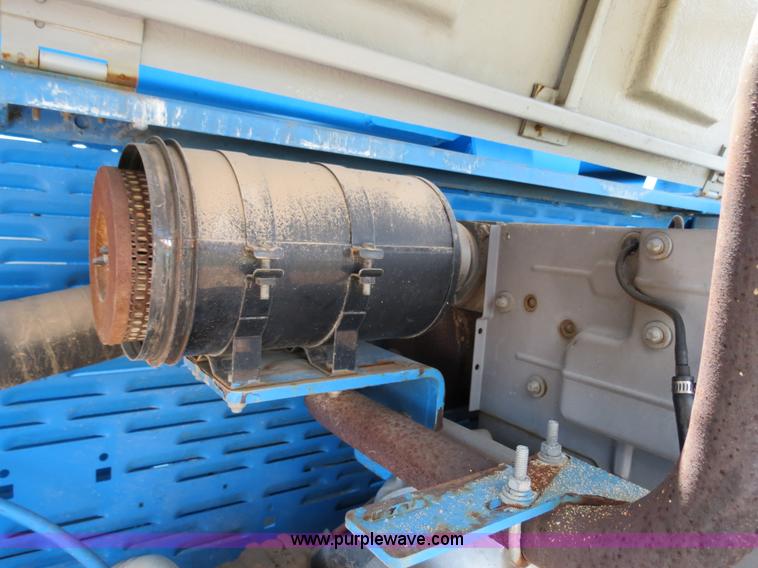 image for item B2387 1999 Genie Z-60/34 articulating boom lift