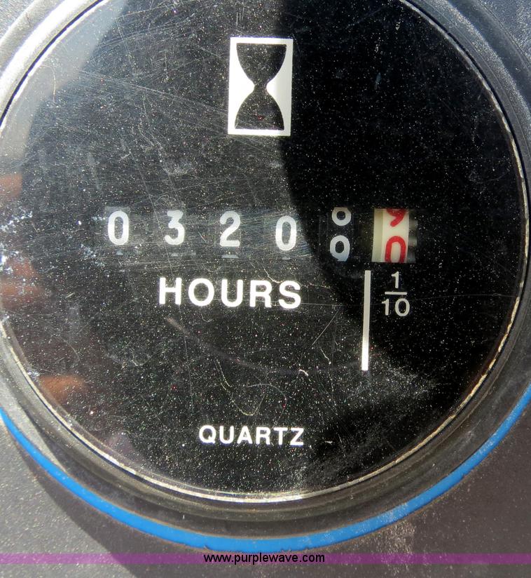 image for item B2387 1999 Genie Z-60/34 articulating boom lift