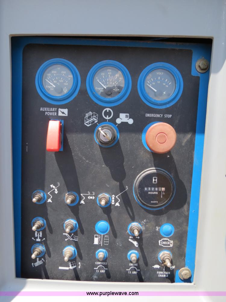 image for item B2387 1999 Genie Z-60/34 articulating boom lift